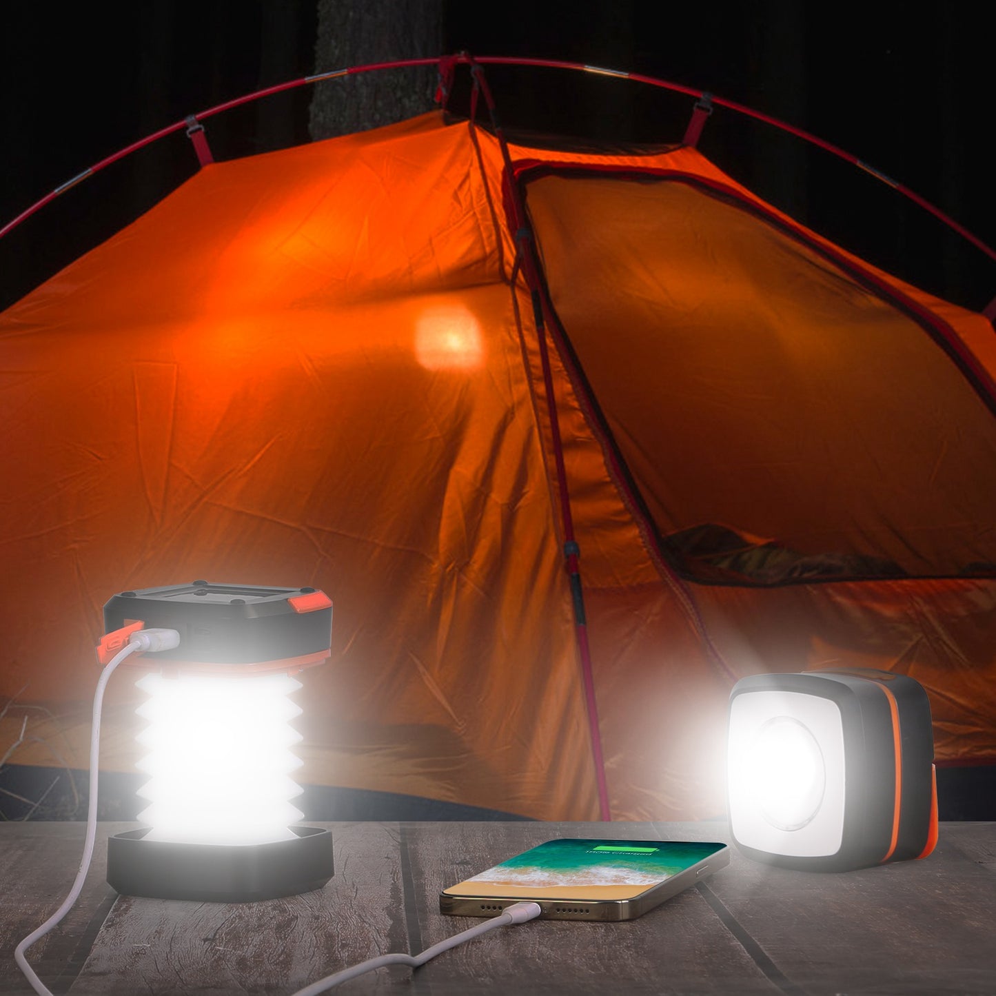 Camping scene with orange tent, lantern, and smartphone on a dark background