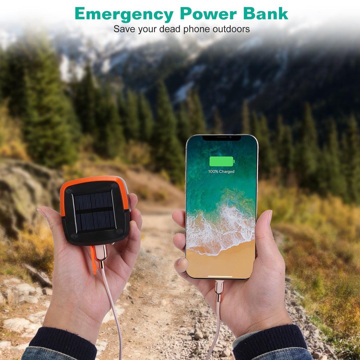 Emergency power bank charging a smartphone outdoors with mountains in the background
