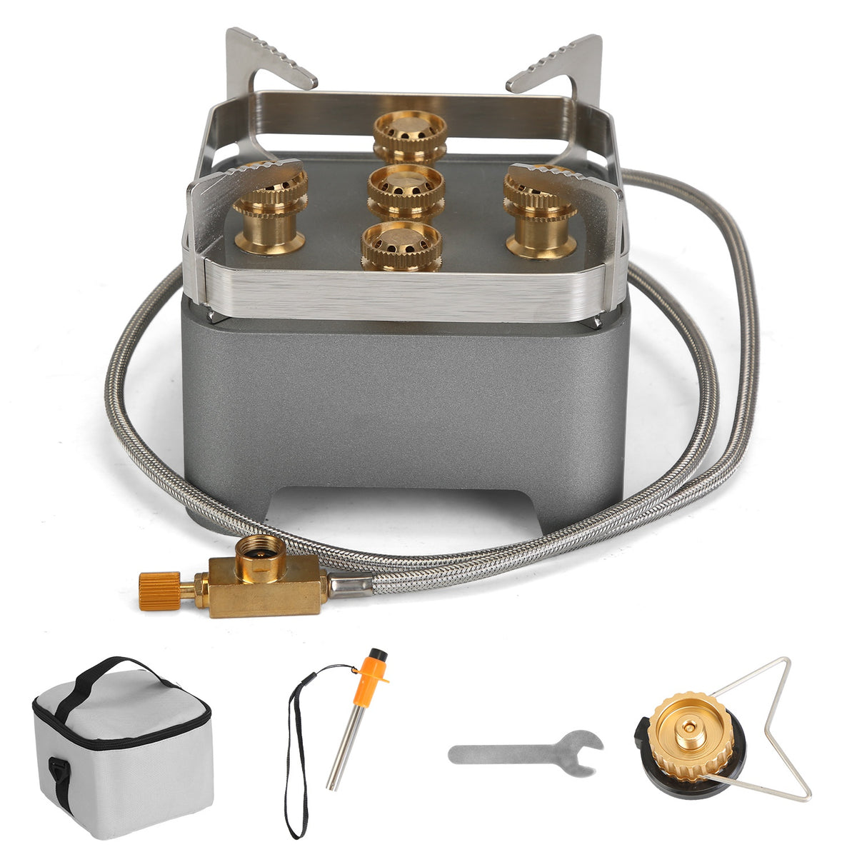 A portable camping stove set shown on a white background, including a gray and stainless steel burner unit with brass gas nozzles, braided gas hoses, a fuel regulator, a small gray carrying bag, a torch lighter, a wrench, and a metal support bracket.