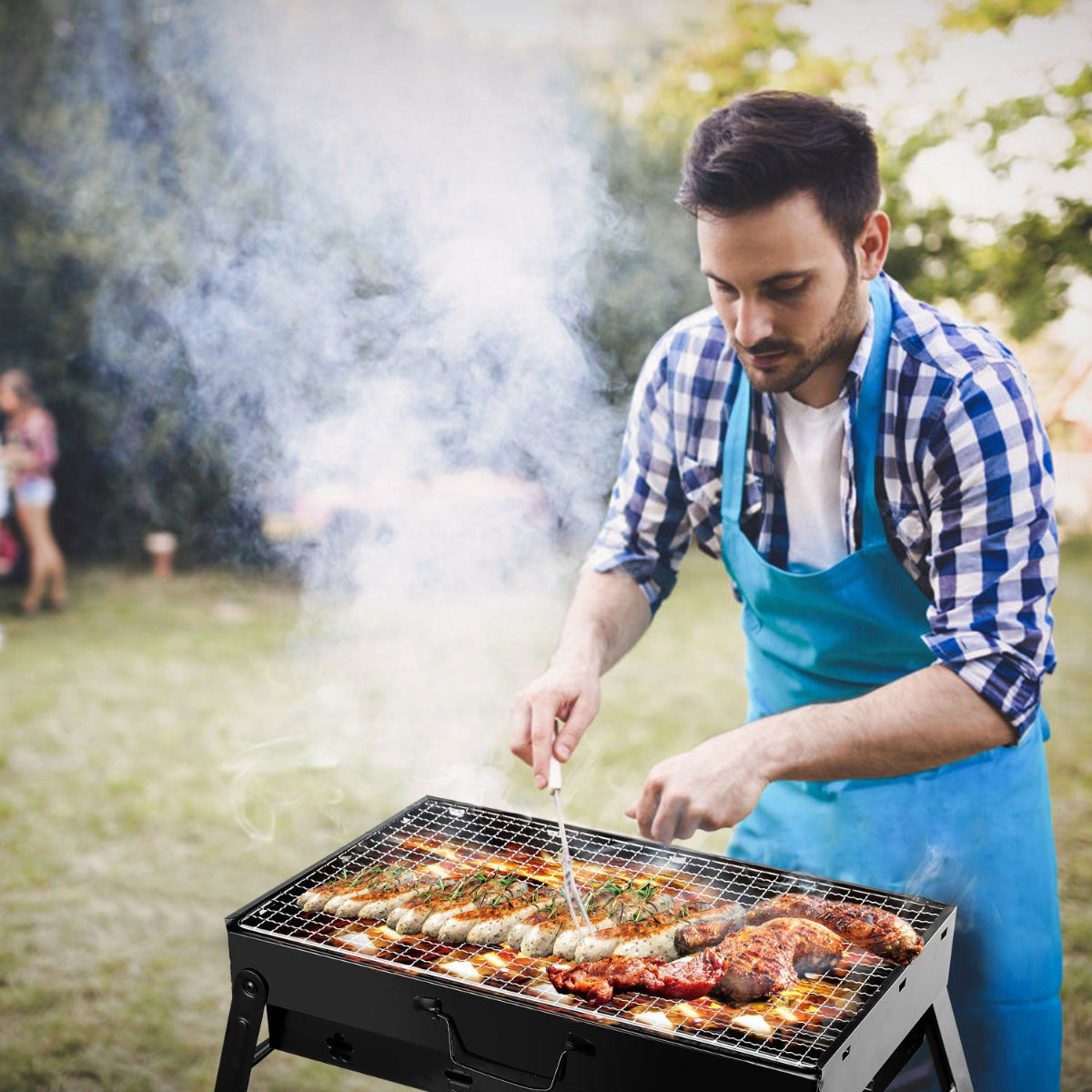 Man grilling food on a barbecue grill outdoors