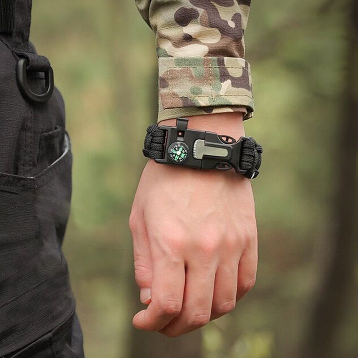 Backpacker wearing the first aid kit while hiking outdoors